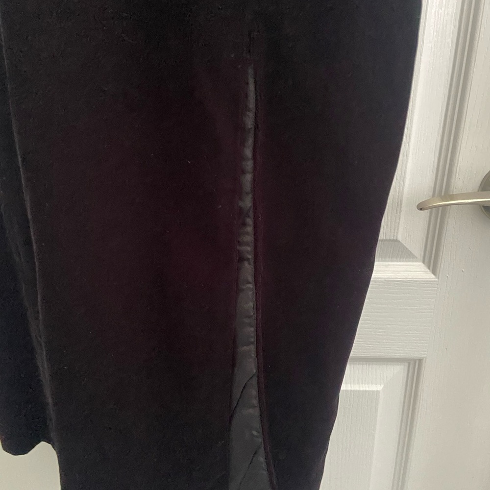 Elegant Black velvet dress. Zips in the back and buttons as well.